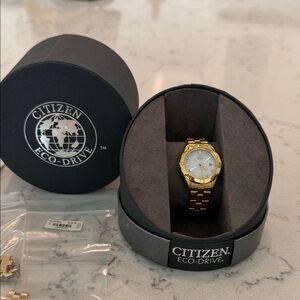 Citizen Gold-Tone Ladies Eco-Drive Watch with White Dial